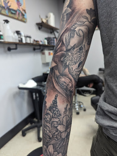 Explore chest tattoo men ideas, creative tattoo ideas in Pittsburgh, available at Crimson Lotus Collective