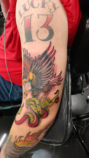 Explore madara tattoo ideas, creative tattoo ideas in Addison, available at Cat Tattoo