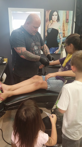 Explore 90's cartoon tattoo ideas, creative tattoo ideas in Bryan, available at Testament Tattoo