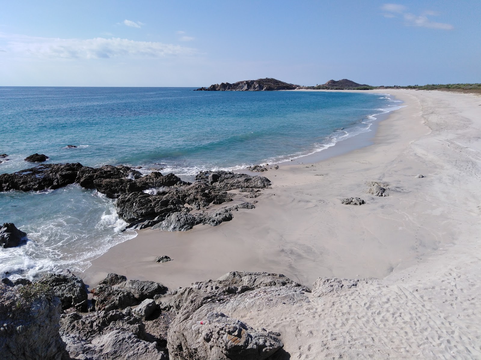 Foto di Santiago Astata beach con una superficie del sabbia fine e luminosa