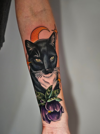 Explore fish tattoo ideas for females, creative tattoo ideas in Kansas City, available at Golden Stag Tattoo and Gallery