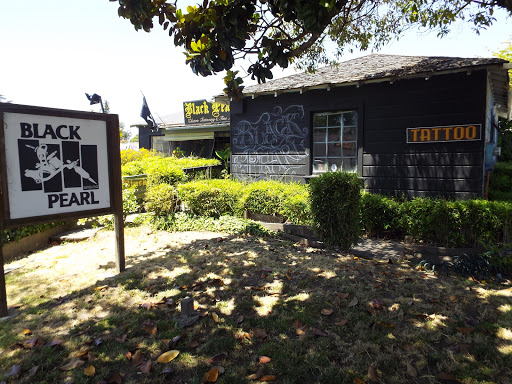 Explore dog paw print tattoo ideas, creative tattoo ideas in Santa Cruz, available at Black Pearl Tattoo Santa Cruz