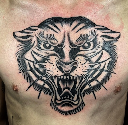 Explore mens behind the ear tattoo ideas, creative tattoo ideas in Columbus, available at Lacquer Gallery TATTOO