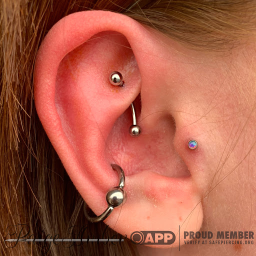 Explore number 7 tattoo ideas, creative tattoo ideas in Oshkosh, available at Piercings by Paige at Big Guns Tattoo