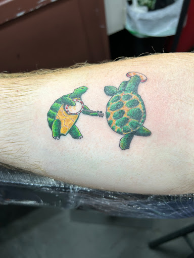 Explore thigh tattoo ideas for men, creative tattoo ideas in Clearwater, available at Foolish Pride 2 Tattoo Co.