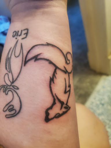 Explore f1 tattoo ideas, creative tattoo ideas in Mason City, available at Technicolor Tattoo Studio