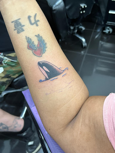 Find armband tattoo ideas for your next unique tattoo in Addison at Cat Tattoo