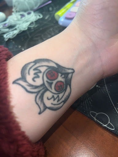 Explore cover up ideas for wrist tattoo, creative tattoo ideas in Charleston, available at Nemesis Tattoo and Art Gallery