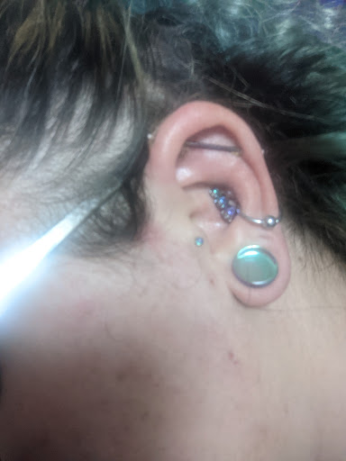 Find leo constellation tattoo ideas for your next unique tattoo in Sun Prairie at Blue Lotus Tattoo & The Piercing Lounge