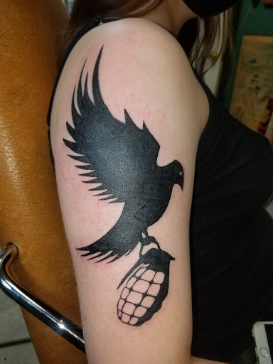 Explore saxophone tattoo ideas, creative tattoo ideas in Odessa, available at Little Dragon Tattoos Studio