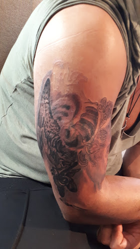 black angel tattoo kiskunhalas