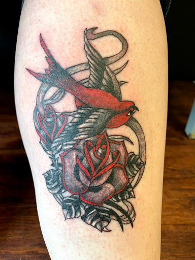 Find mexican american flag tattoo ideas for your next unique tattoo in Seymour at American Gypsy Tattoo Corp.