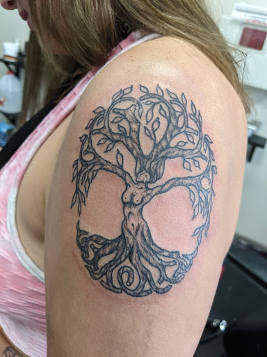 Explore light tattoo ideas, creative tattoo ideas in Slippery Rock, available at Dinky Dachshund Tattoo Parlor