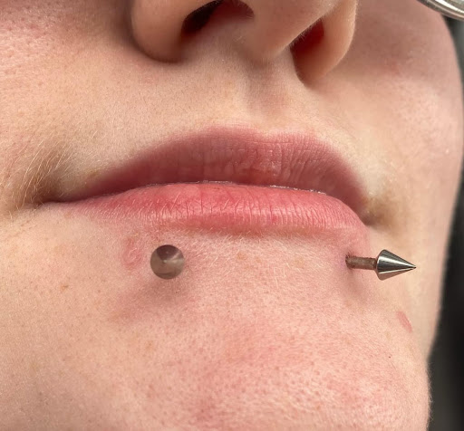 Explore colourful tattoo ideas, creative tattoo ideas in Marietta, available at The Queen Bee Tattoo and Piercing Parlour