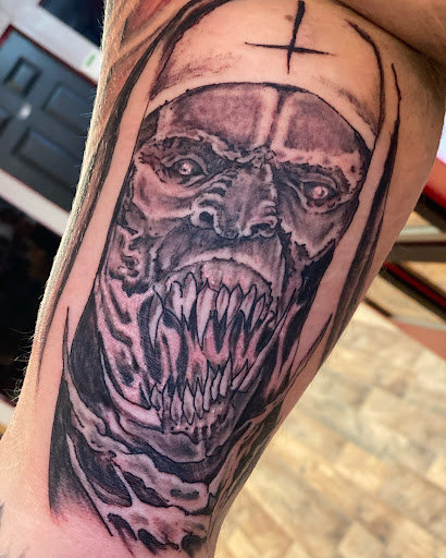 Explore partial sleeve tattoo ideas, creative tattoo ideas in Pikeville, available at The Carbon Canary Tattoo Studio
