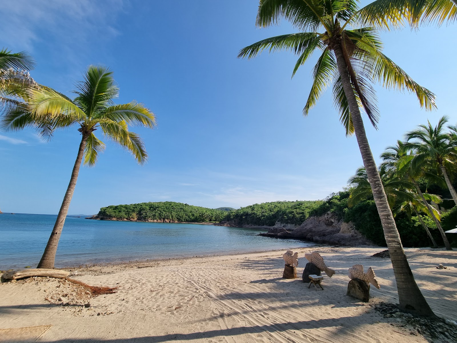 Paraiso beach'in fotoğrafı hafif ince çakıl taş yüzey ile