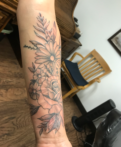 Explore flower tattoo cover up ideas, creative tattoo ideas in Las Vegas, available at Artforms Tattoo