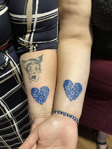 Explore small thigh tattoo ideas, creative tattoo ideas in Ontario, available at Rose & Dagger Ink