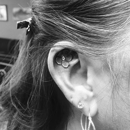 Explore hand and finger tattoo ideas, creative tattoo ideas in Lodi, available at Emerald Tattoo & Piercing - Lodi