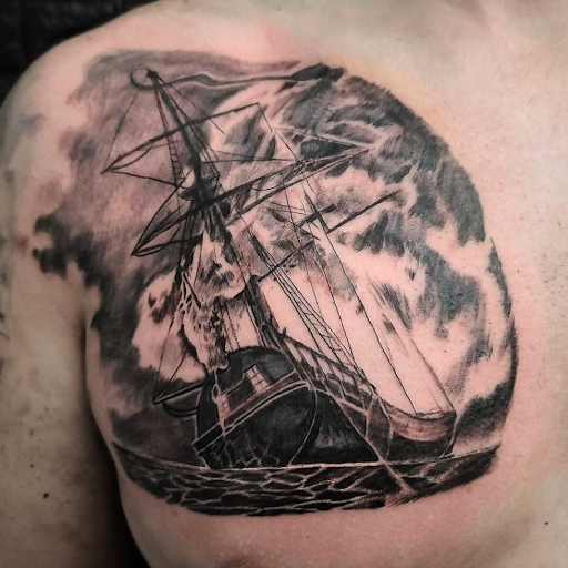Explore back tattoo ideas men, creative tattoo ideas in Kenosha, available at Kenosha Tattoo Company