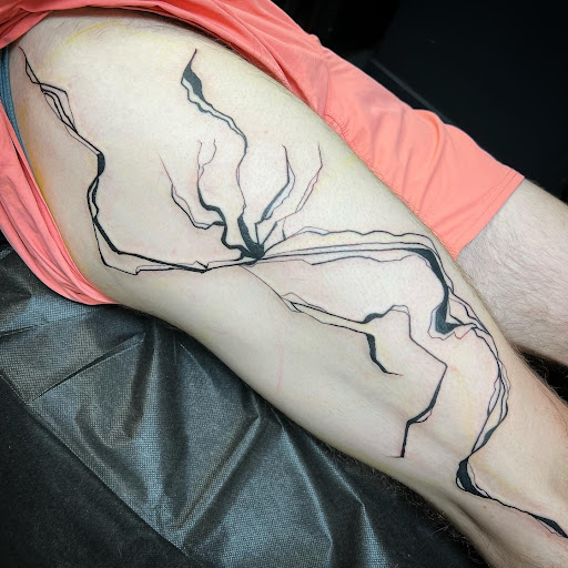 Explore first tattoo ideas for black females, creative tattoo ideas in Buffalo, available at True Gloom Tattoo Studio