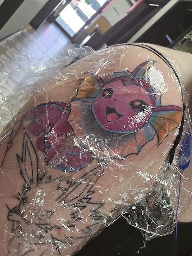 Explore snake tattoo ideas, creative tattoo ideas in Jacksonville, available at Electric Legacy Tattoo