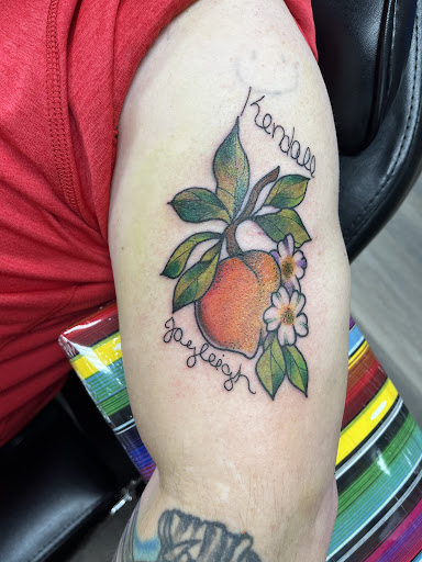 Explore catfish tattoo ideas, creative tattoo ideas in Hernando, available at Blue Panther Tattoo Co