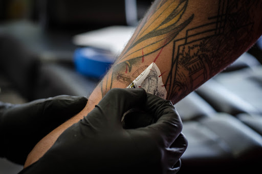 Explore hustle tattoo ideas, creative tattoo ideas in Sykesville, available at Foxwood Tattoo Collective