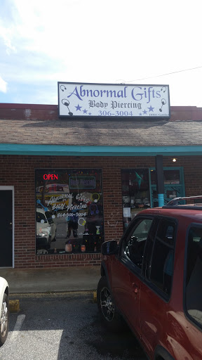 Explore small arm tattoo ideas for guys, creative tattoo ideas in Easley, available at Abnormal Gifts Body Piercing