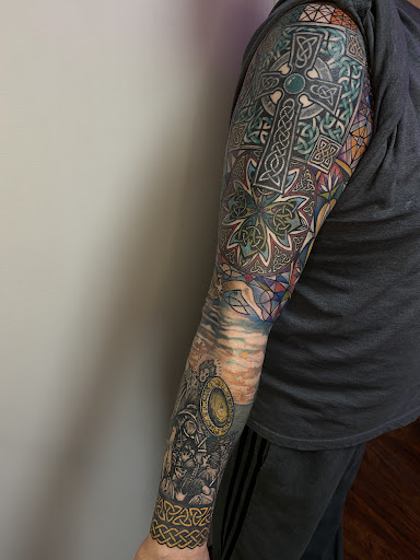 Explore men shoulder tattoo ideas, creative tattoo ideas in Red Bank, available at Resilient Visions