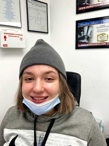 Explore invictus tattoo ideas, creative tattoo ideas in Myrtle Beach, available at Professional Body Piercing by Jackie