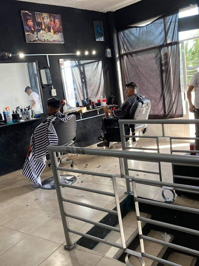 El barrio barber-shop