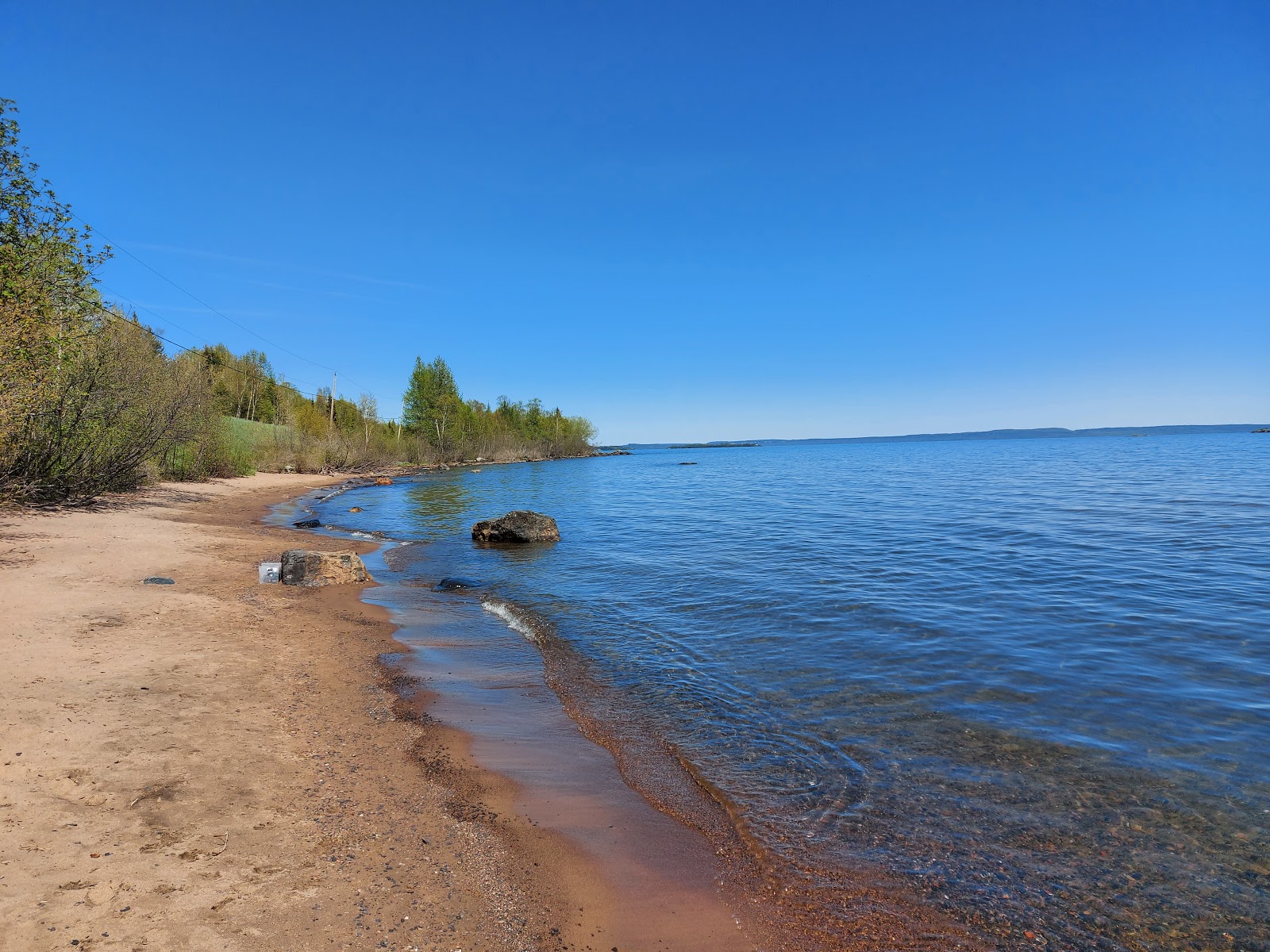 Fotografija Wild Goose Beach z svetel pesek površino