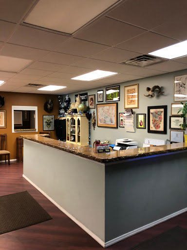 Tattoo Shop «Tribute Tattoo Parlor», reviews and photos, 4718 W Walton Blvd, Waterford Twp, MI 48329, USA