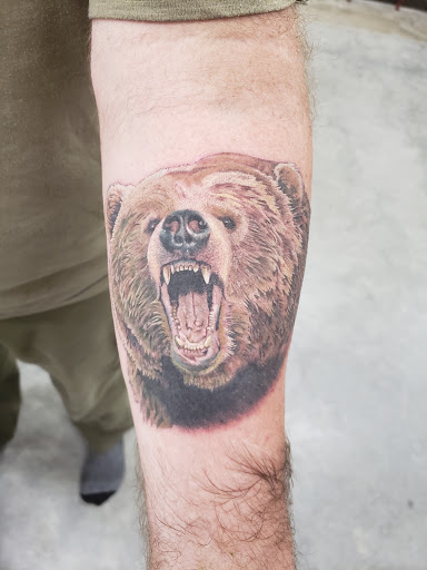 Explore american flag tattoo ideas, creative tattoo ideas in Smyrna, available at Annuit Coeptis Tattoo