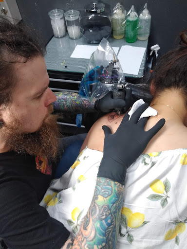 Explore afro tattoo ideas, creative tattoo ideas in Pearland, available at Black List Tattoo & Piercing Co.