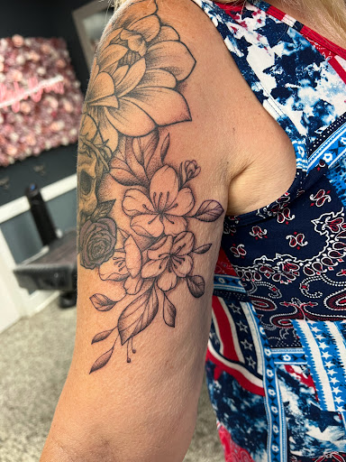 Explore kissing lips tattoo ideas, creative tattoo ideas in Sanford, available at Luv Ink