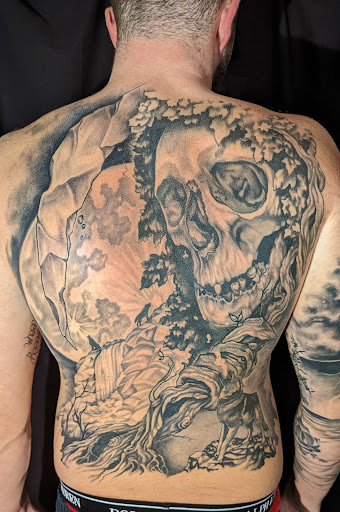 Explore howl's moving castle tattoo ideas, creative tattoo ideas in Saint Paul Park, available at Lady Liberty Tattoo
