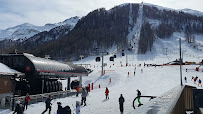 Chalet Odalys Le Cabri du Restaurant américain Sun Bar à Val-d'Isère - n°1