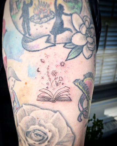 Explore little ghost tattoo ideas, creative tattoo ideas in Charlotte, available at Electric Ink Tattoo