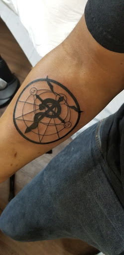 Explore male side tattoo ideas, creative tattoo ideas in Richmond, available at Loose Screw Tattoo