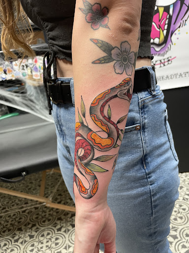 Explore cover up neck tattoo ideas, creative tattoo ideas in Paducah, available at The Tattoo Shop