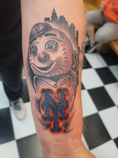 Explore march birth flower tattoo ideas, creative tattoo ideas in Brick, available at Black Panther Tattoo