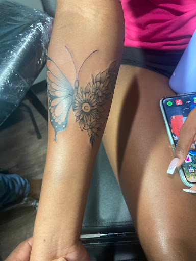 Explore lower arm half sleeve tattoo ideas, creative tattoo ideas in Warner Robins, available at Untold Pain Tattoo Studio
