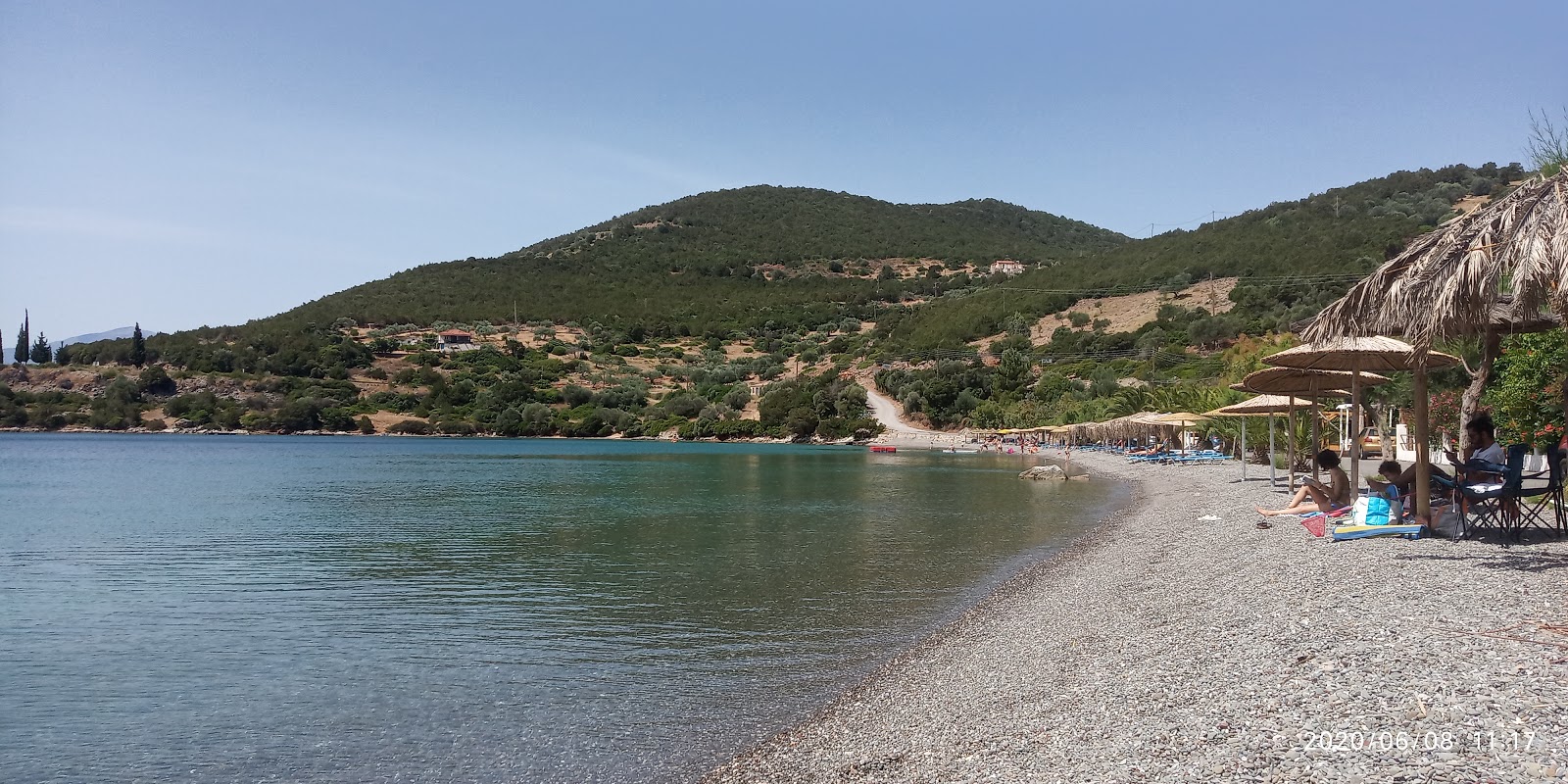 Foto av Agios Nikolaos beach med liten vik