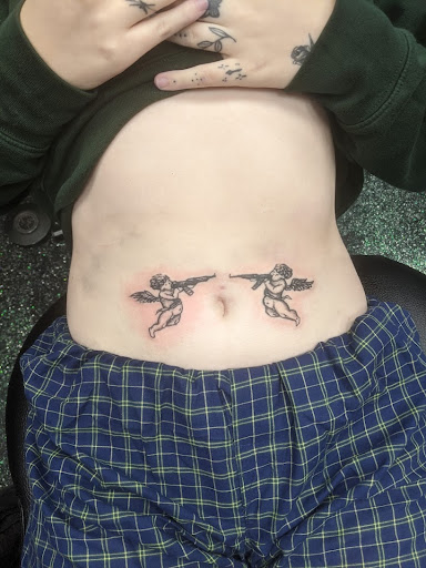 Explore neck tattoo ideas, creative tattoo ideas in Slippery Rock, available at Dinky Dachshund Tattoo Parlor