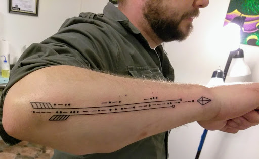 Explore disc golf tattoo ideas, creative tattoo ideas in Hebron, available at Explosive Ink Tattoo