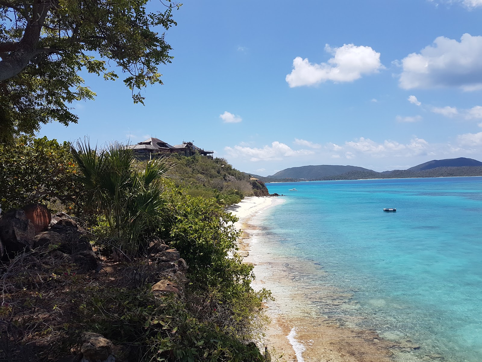 Photo of Necker Island beach with bright sand surface