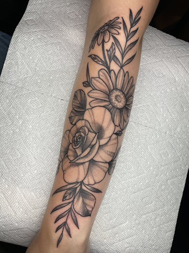 Find ideas for tattoos for moms for your next unique tattoo in Lakeview at Backwoods Tattoo Studio