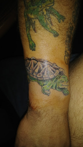 Explore kung fu panda tattoo ideas, creative tattoo ideas in Houghton, available at Edge Tattoo Inc